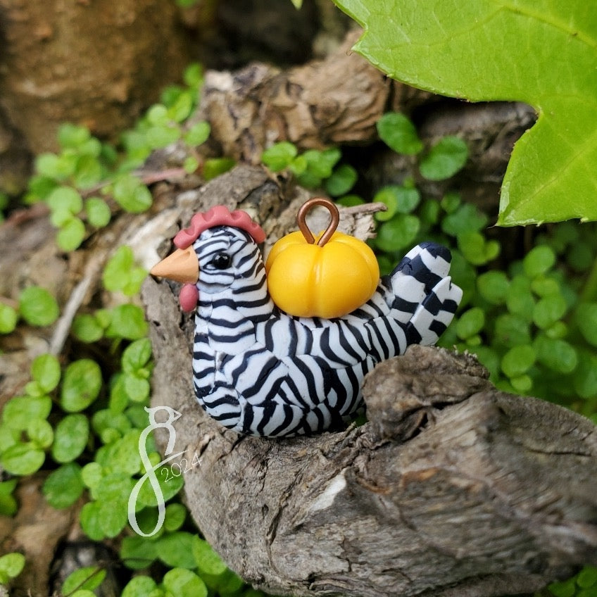 Glowing Yellow Pumpkin Chicken Charm